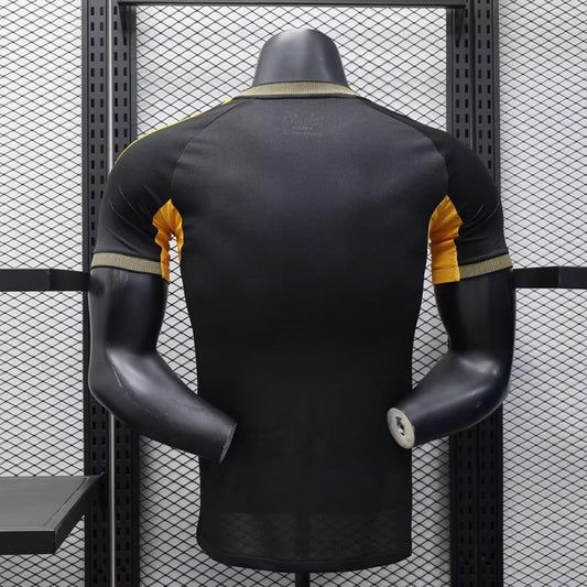 Player Version 25/26 Real Madrid Black with Gold Accents and Emirates Sponsor Jersey